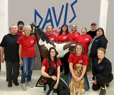 DAVIS Plastic employees (2023) with their dogs at the Brandon, WI location.